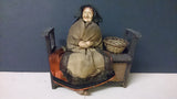 Doll, Hand Made, Older Women Sitting On a Bench With Basket Of Meats - Roadshow Collectibles